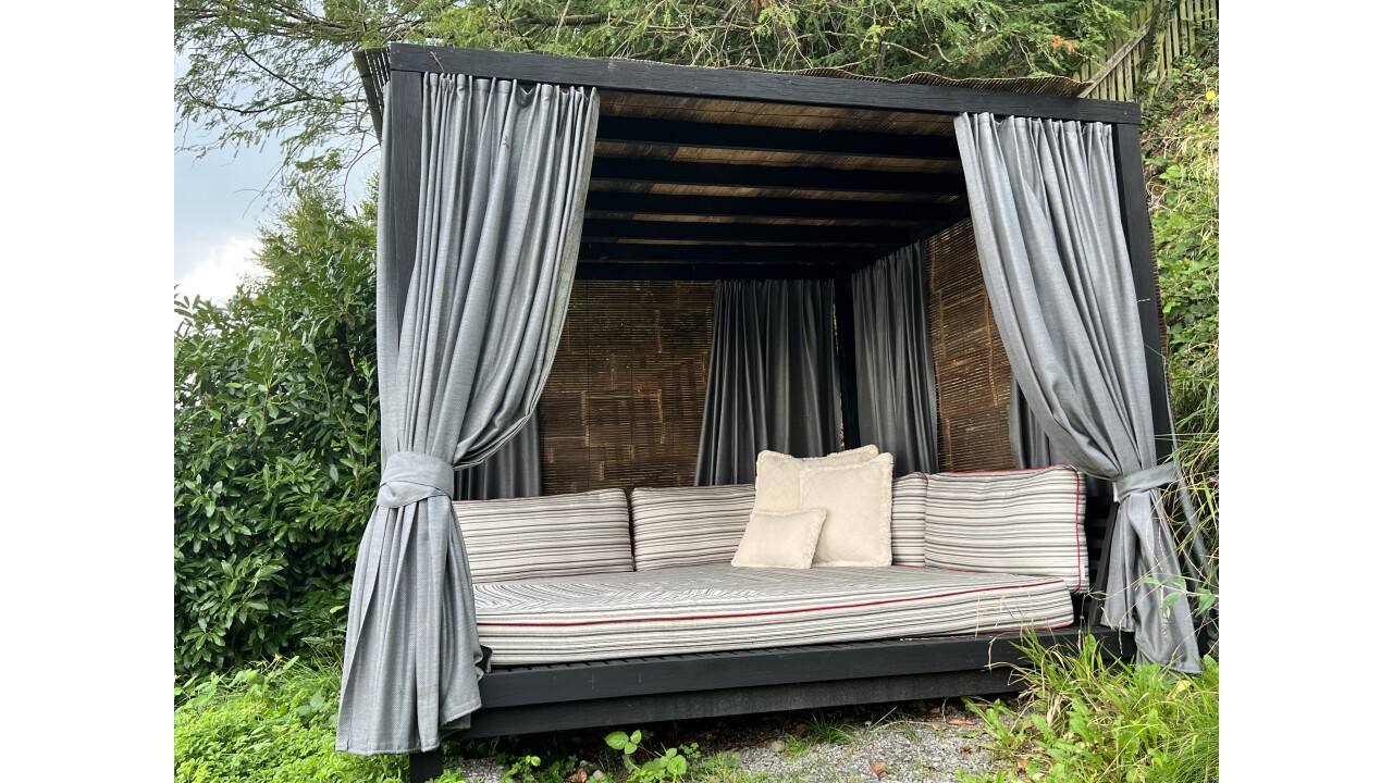 Iron Wood Akira Daybed with Bamboo blinds and curtains