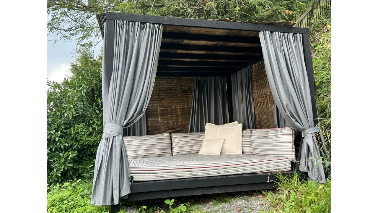 Iron Wood Akira Daybed with Bamboo blinds and curtains