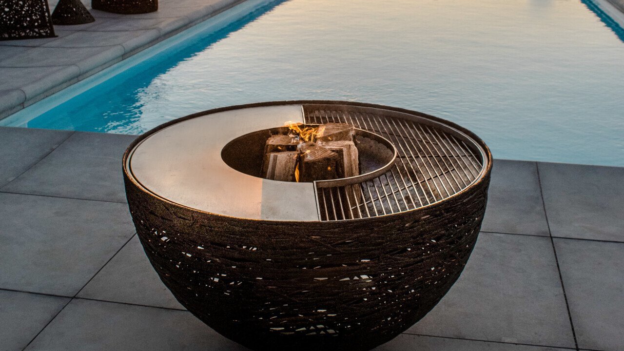 Lava NEST fire pit & tepanyaki grill, stylish and functional!