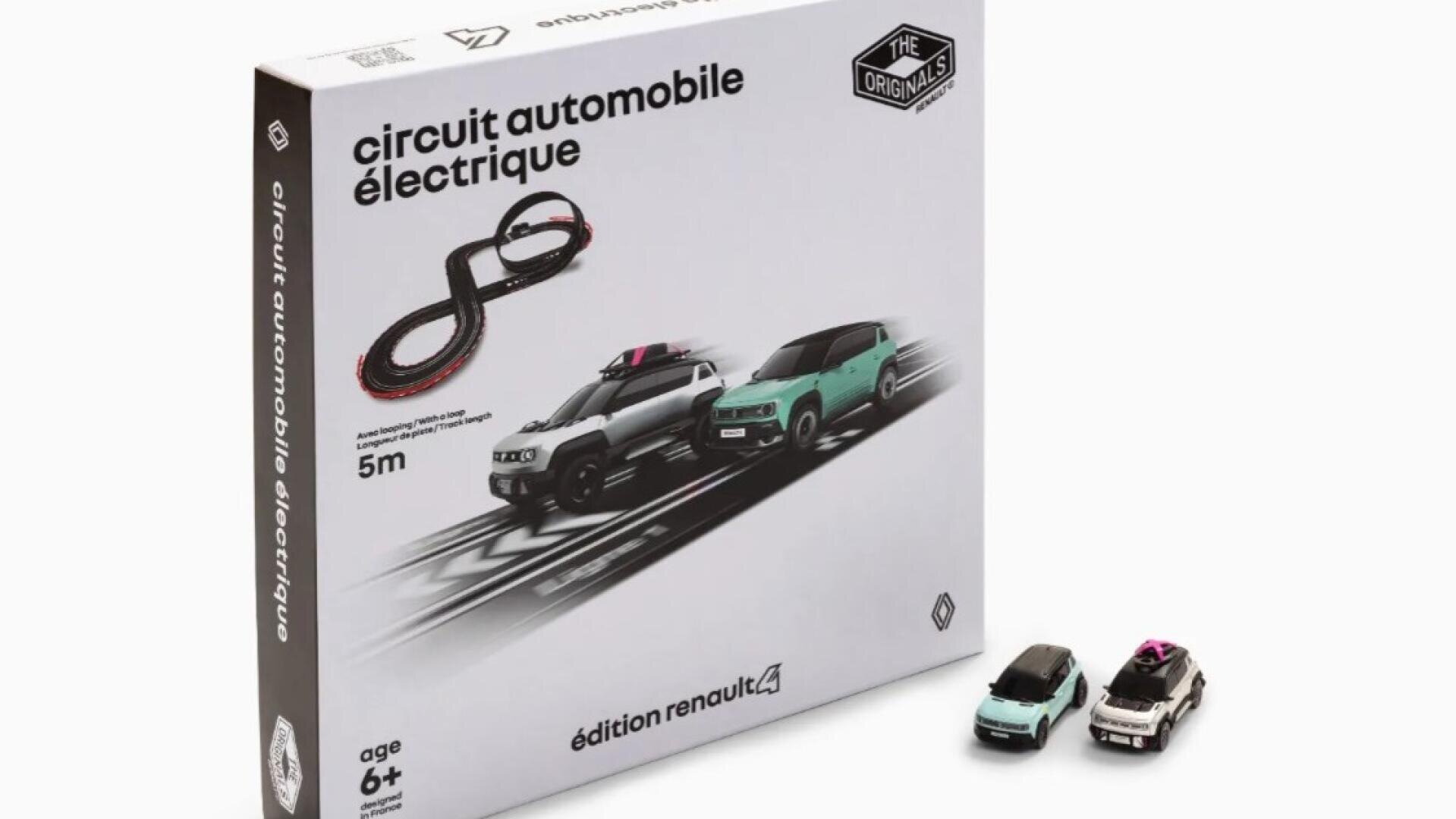 A packaged electric toy car racing set with the inscription circuit automobile électrique stands next to two small toy cars, one white and one light blue. There are pictures of the cars and the race track on the box.