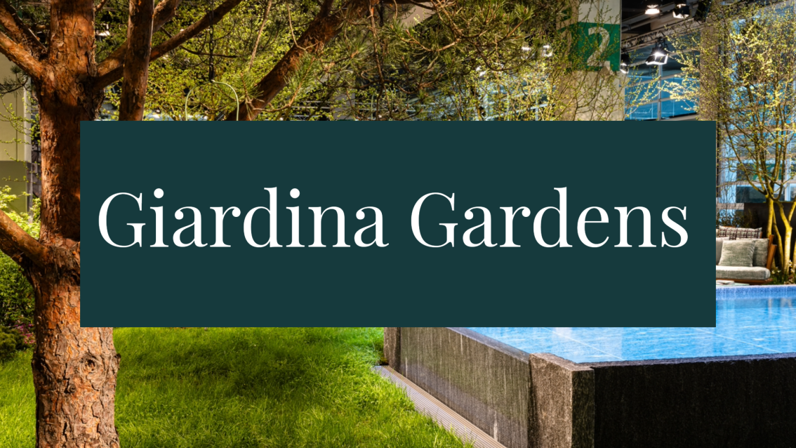 A landscaped indoor garden with green grass, trees, and a small pool. Overlaid text reads Giardina Gardens in large white letters on a dark green rectangle.